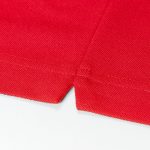 5.3オンスドライカノコのポロシャツ(レッド)の裾の画像