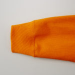10.0オンスのスウェットフルジップパーカ(オレンジ)の袖元